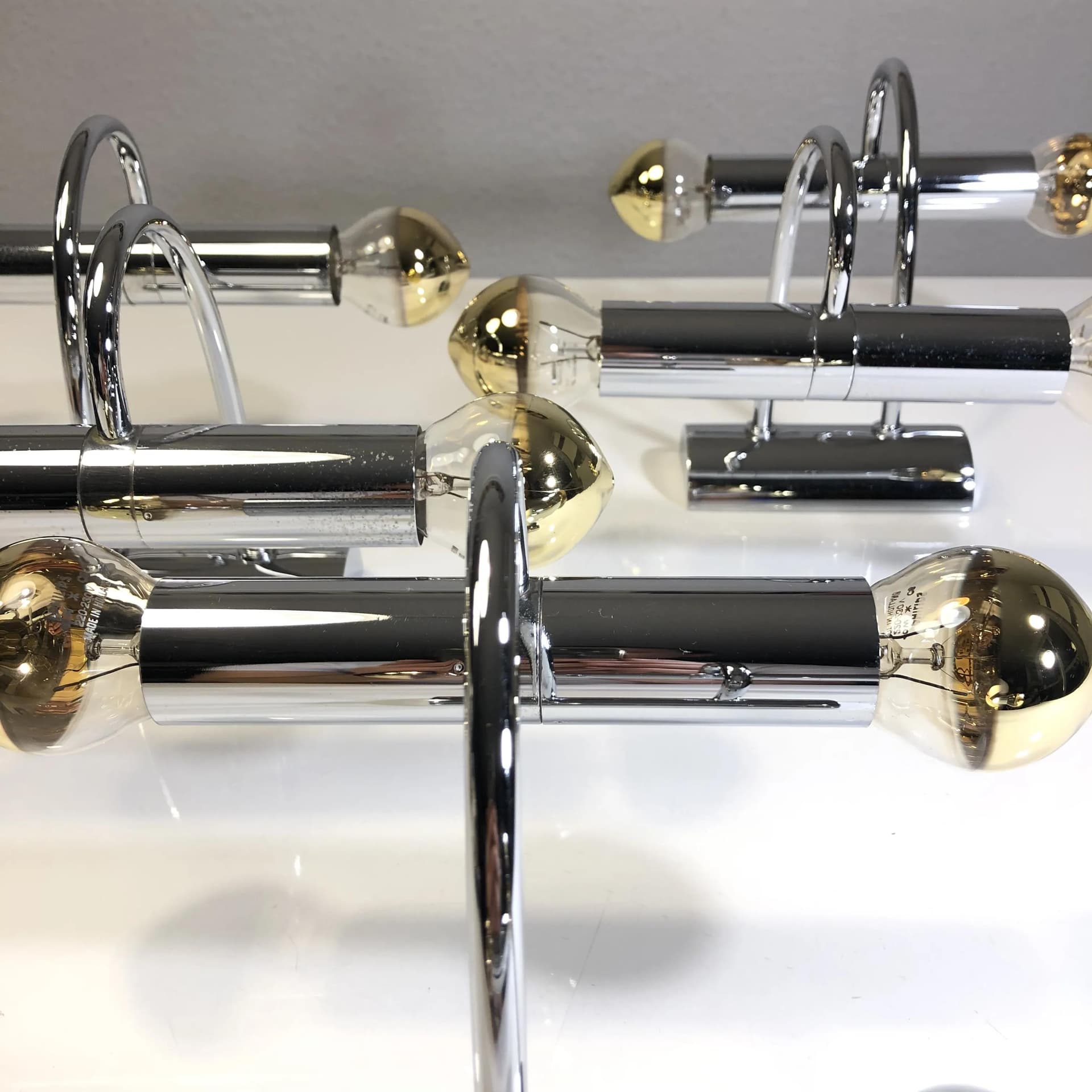 Set of Three Wall Sconces, Space Age, silver chrome-plated brass, Cosack Leuchten, Germany, 1960s. - 31163