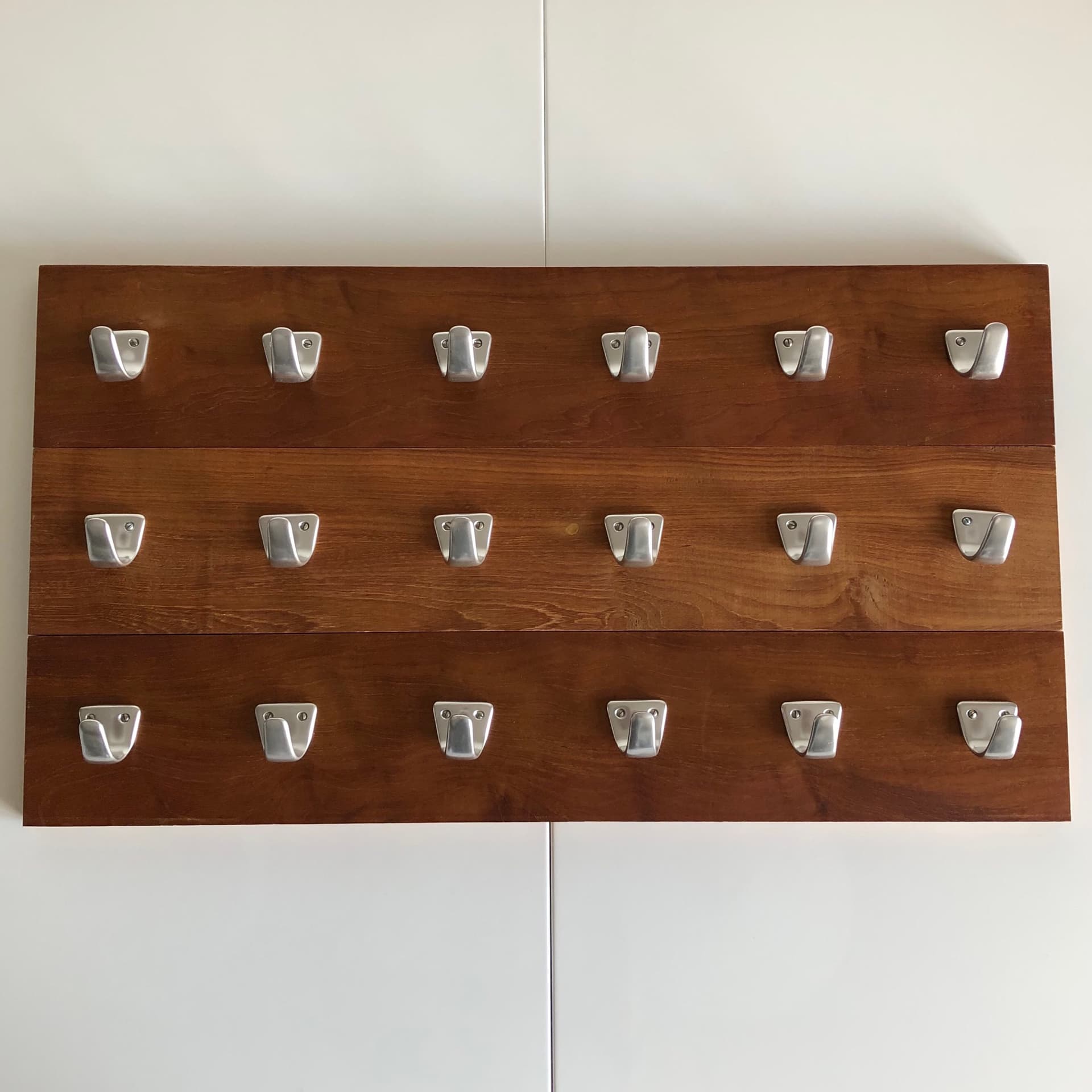 Wall-mounted coat rack, brown teak, silver aluminium, Germany, 1970s. - 33668