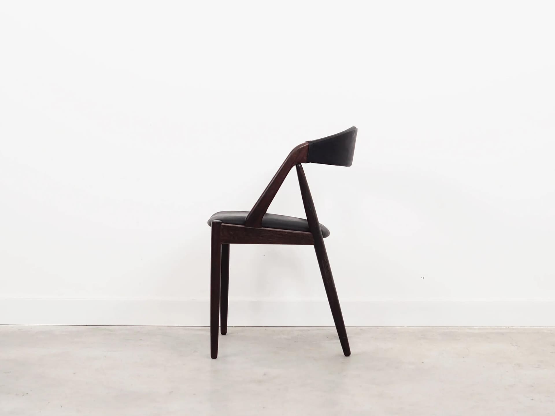 Set of four chairs, brown rosewood, black natural leather, by K. Kristiansen, Denmark, 1970s. - 40131