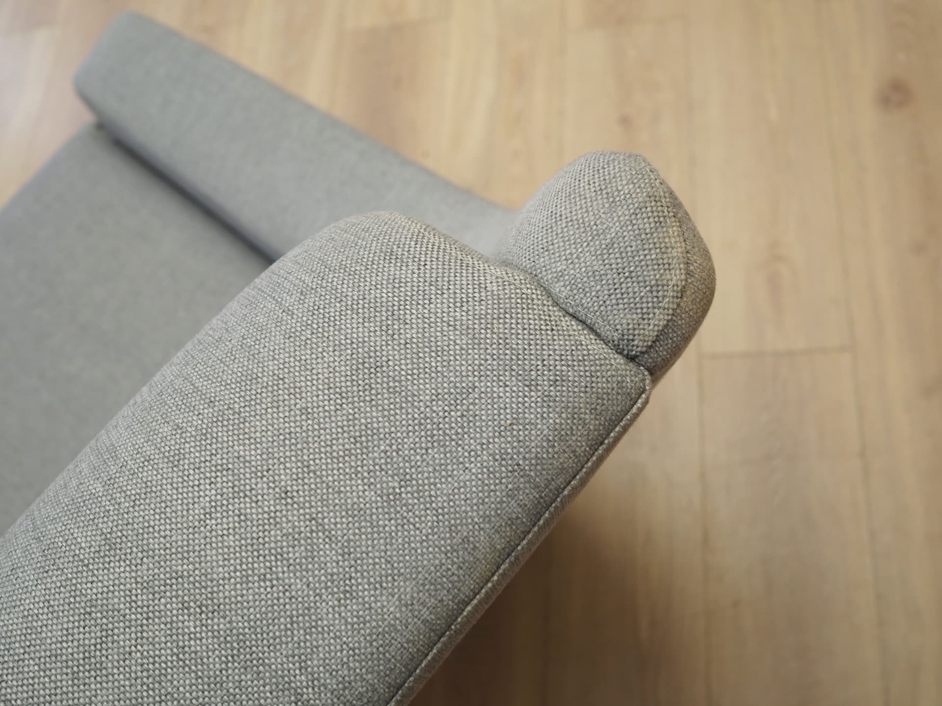 Armchair, grey fabric, wood, Denmark, 1970s. - 50415