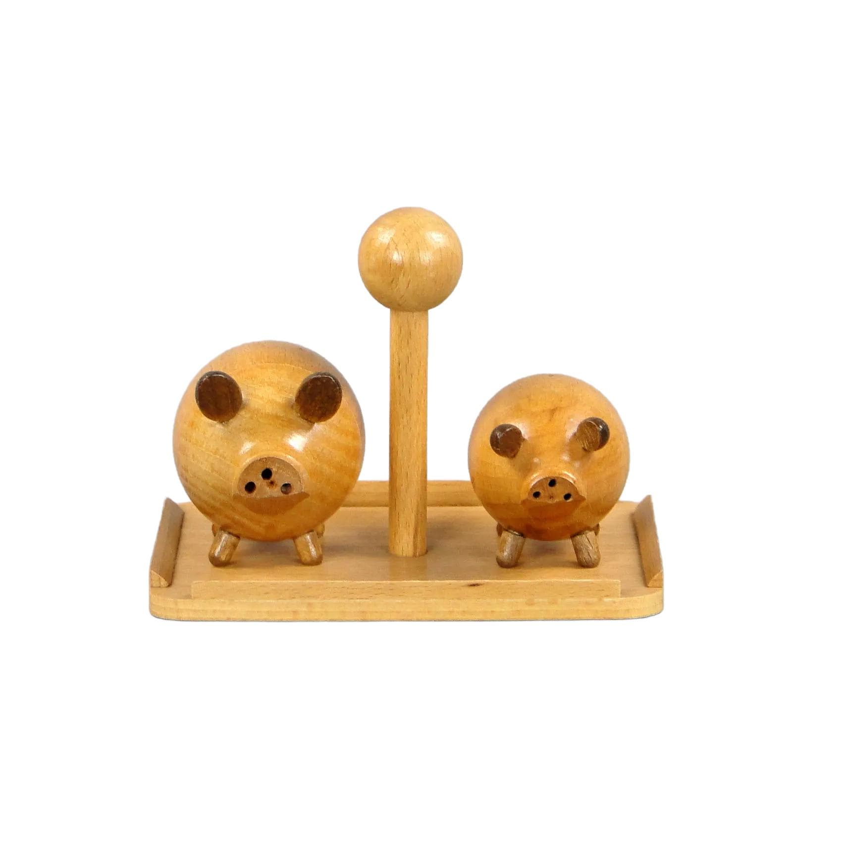Pair of pig salt shakers, light brown mahogany wood, Sweden, 1960s.