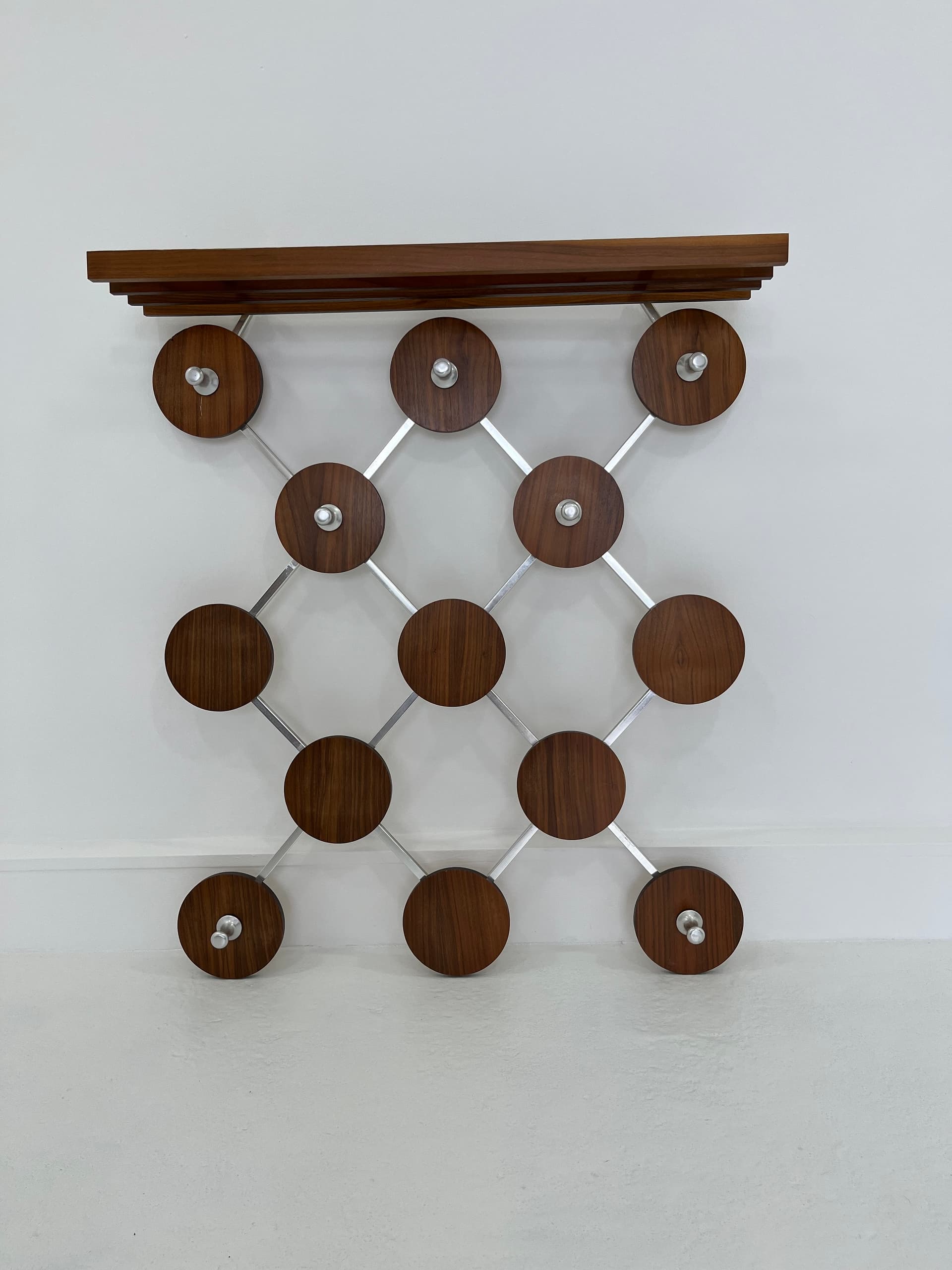 Wall-mounted rack, walnut, metal, Scandinavia, 1960s. - 45925