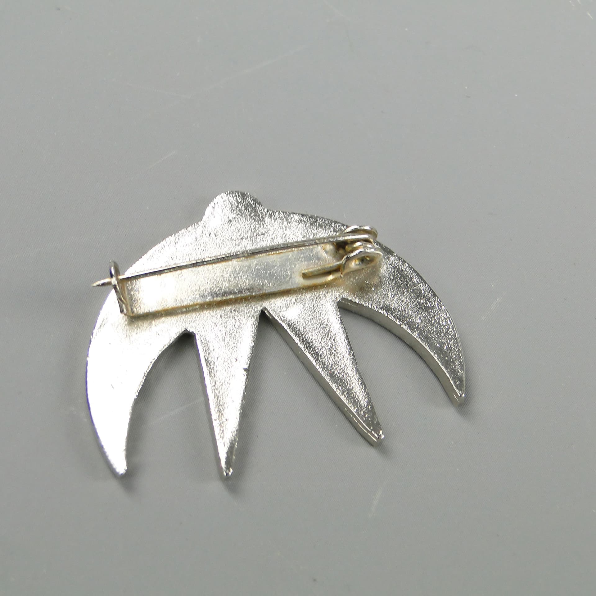 Brooch First Swallow, multicolor, enamelled metal, by J. Treutler, Poland, 1950s. - 60277