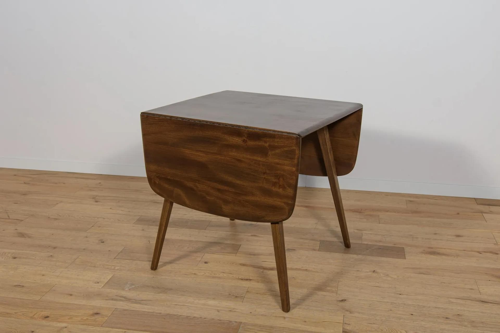 Drop-leaf dining table, brown, beech, by L. Ercolani, United Kingdom, 1960s. - 72062
