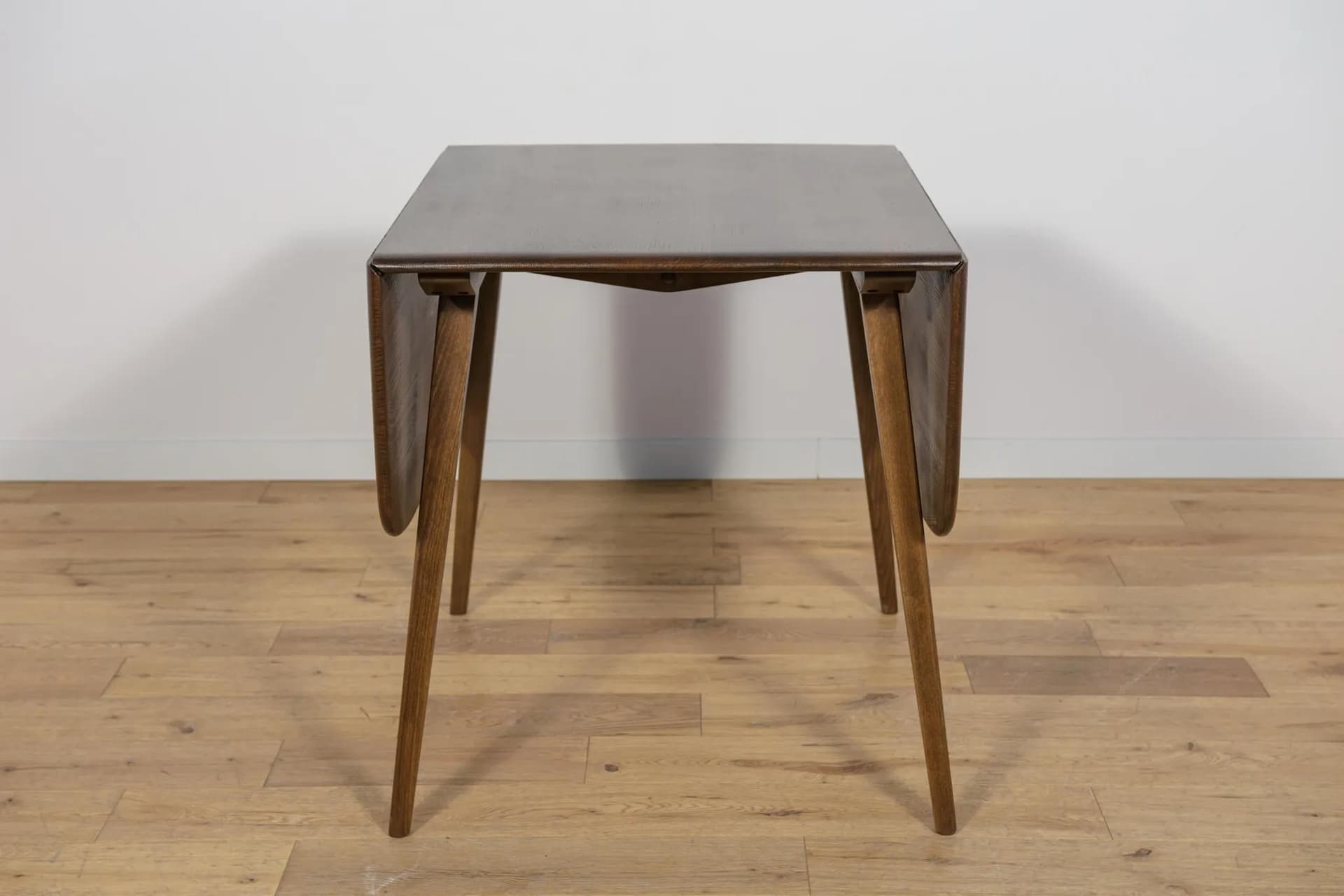 Drop-leaf dining table, brown, beech, by L. Ercolani, United Kingdom, 1960s. - 72057