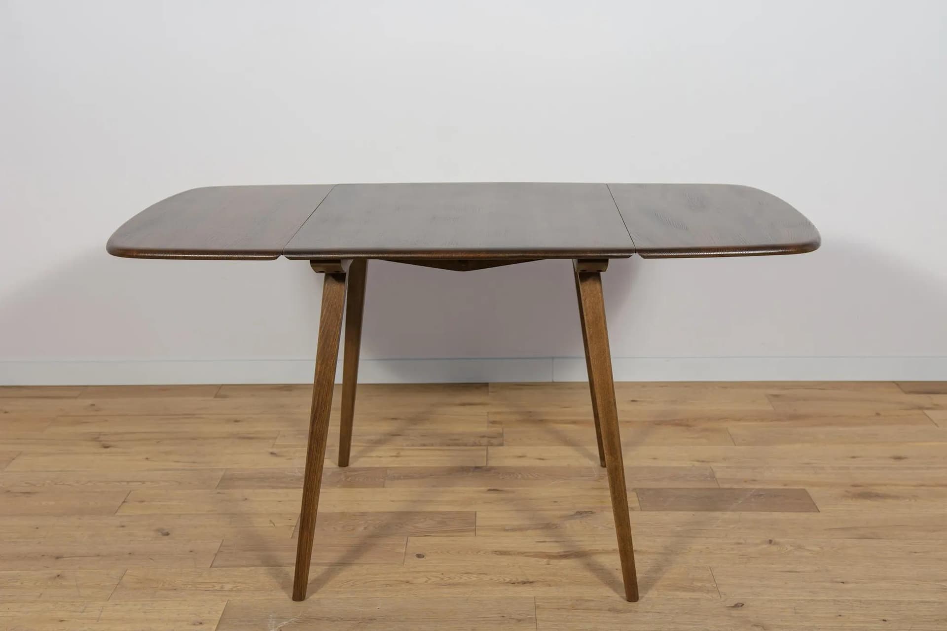 Drop-leaf dining table, brown, beech, by L. Ercolani, United Kingdom, 1960s. - 72061
