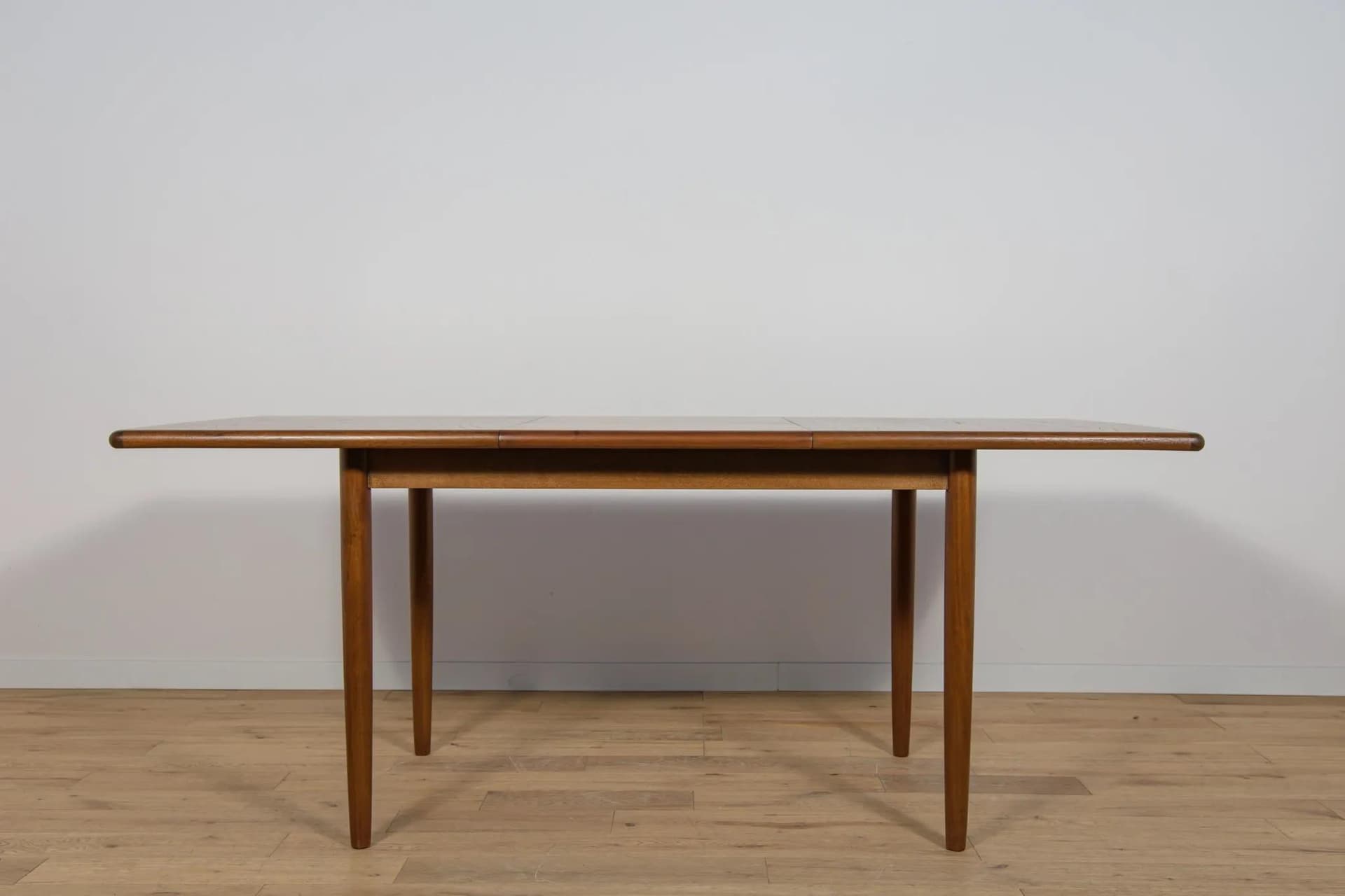 Dining table Meredew, brown teak, United Kingdom, 1970s. - 72012