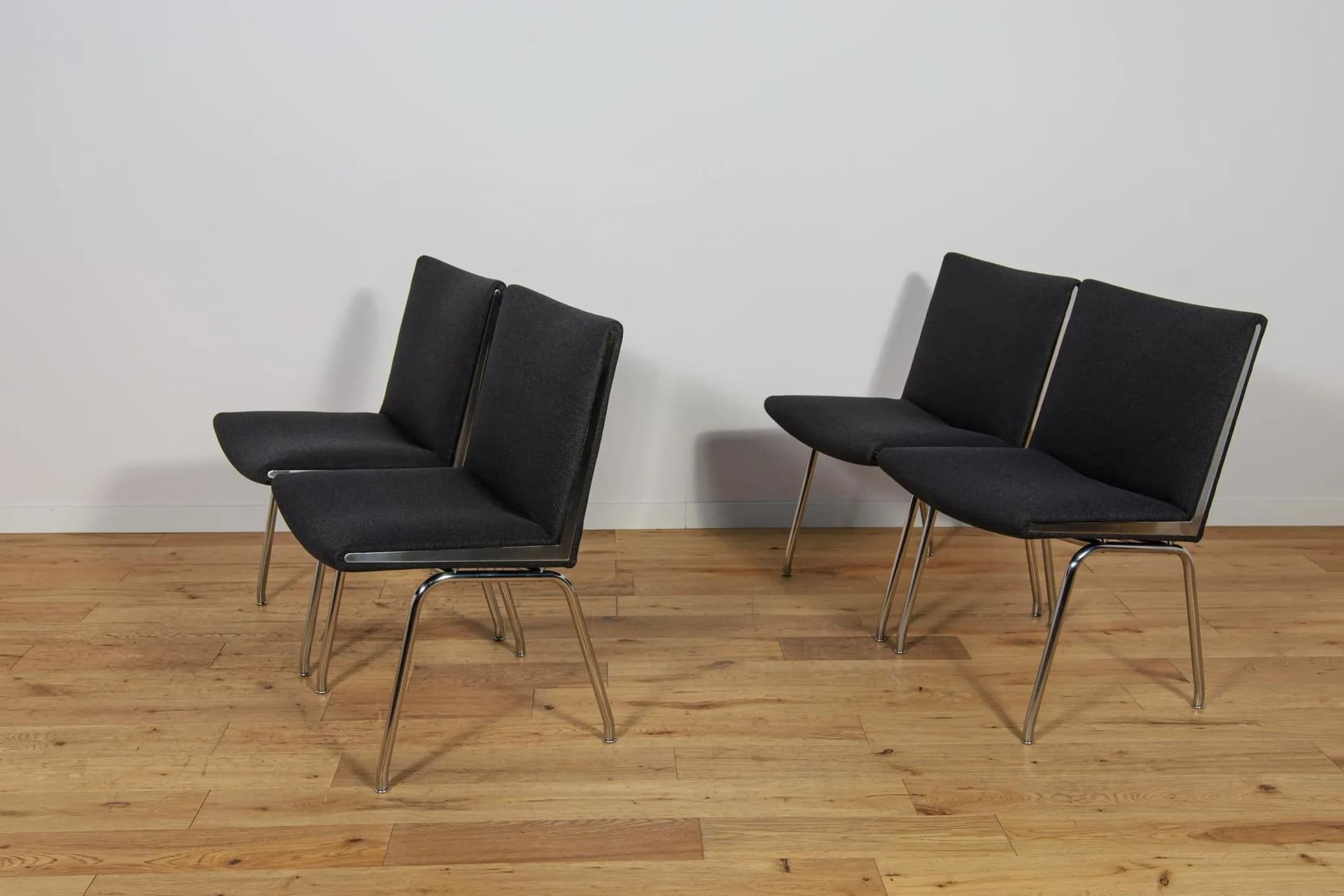 Set of Four Airport Armchairs AP-38, black wool, chrome steel, by H. J. Wegner, Denmark, 1950s. - 71741