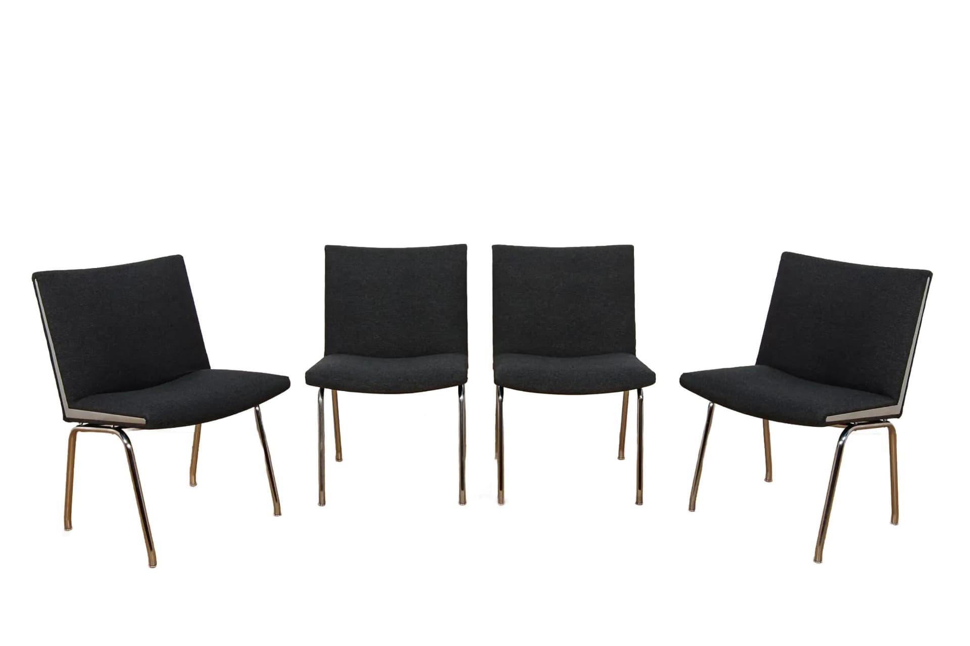 Set of Four Airport Armchairs AP-38, black wool, chrome steel, by H. J. Wegner, Denmark, 1950s.