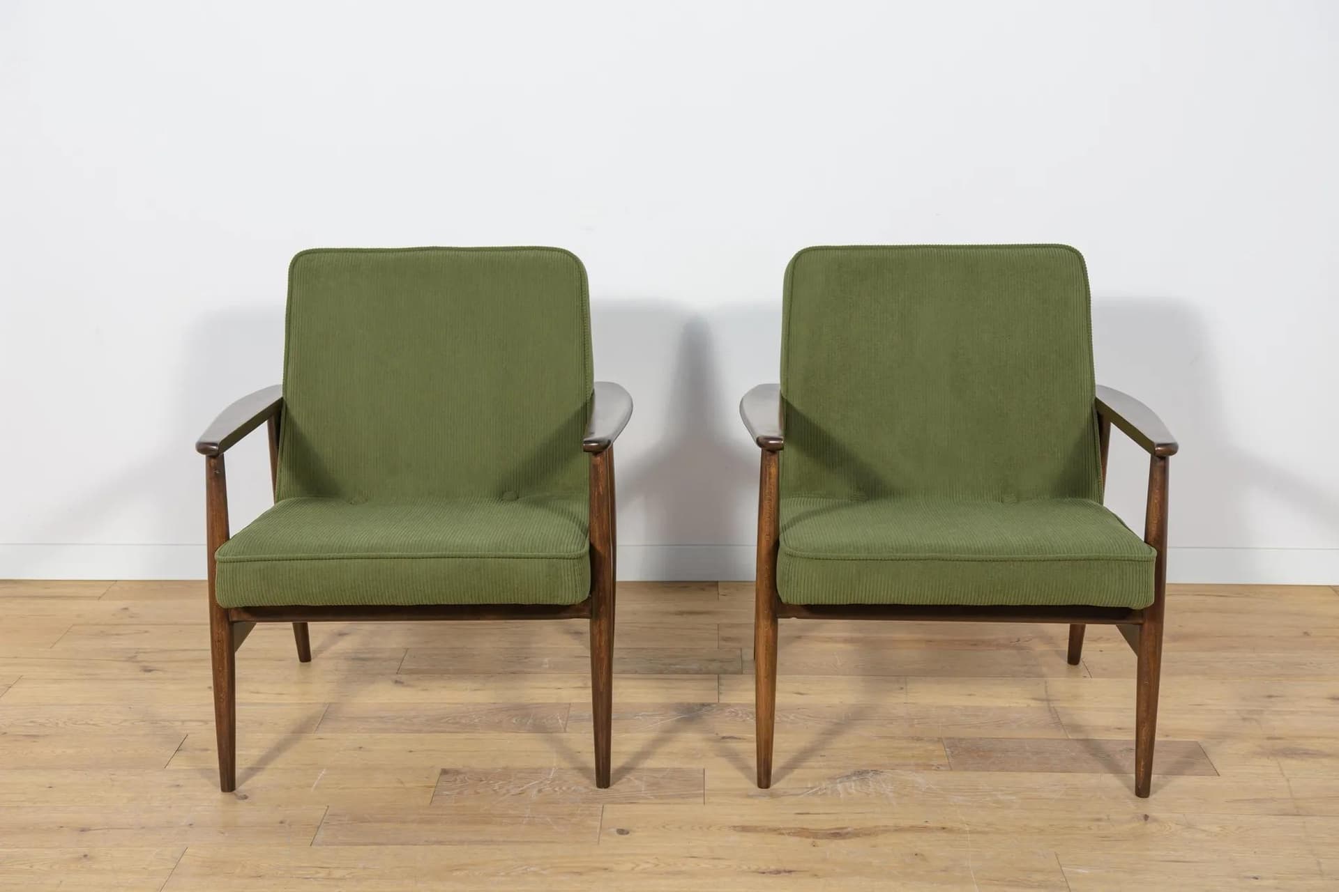Pair of armchairs Typ 300-192, olive corduroy, rosewood-stained beech, by J. Kędziorek, Poland, 1970s. - 71111