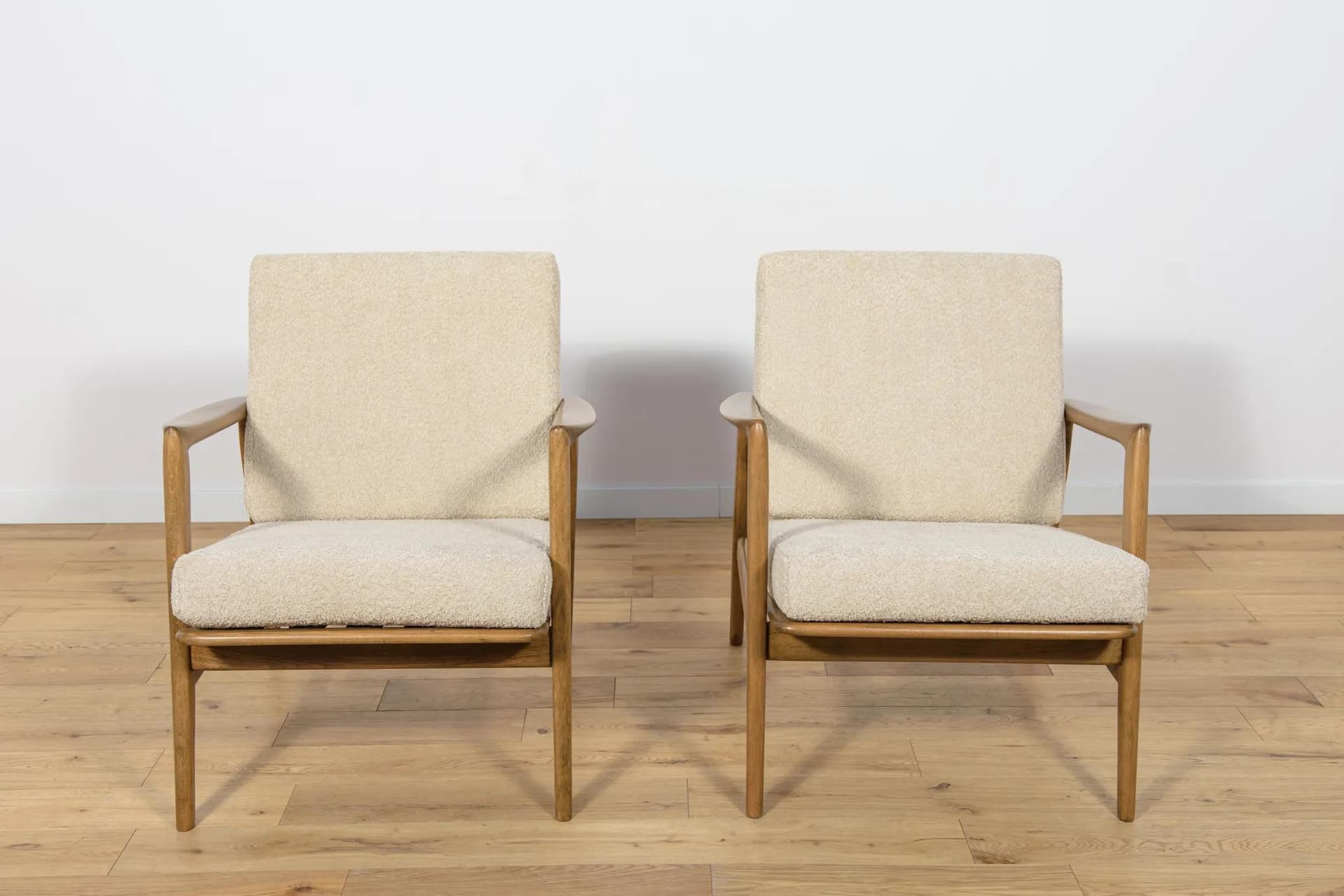 Pair of armchairs 300-139, beige boucle, walnut-stained beech, Swarzędzka Fabryka Mebli, Poland, 1960s. - 70992
