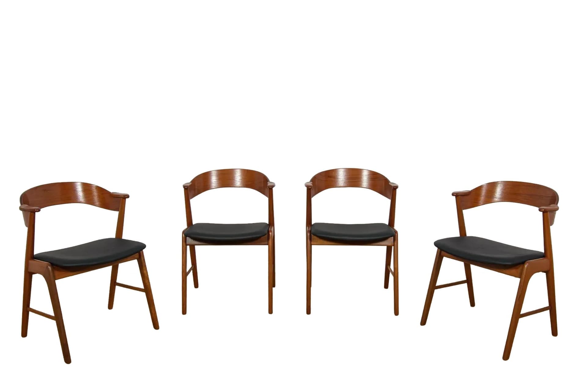 Set of four chairs, brown teak, black leather, Denmark, 1960s.