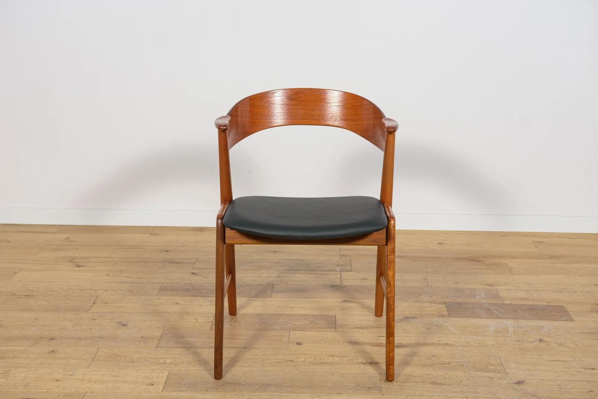 Set of four chairs, brown teak, black leather, Denmark, 1960s. - 70960