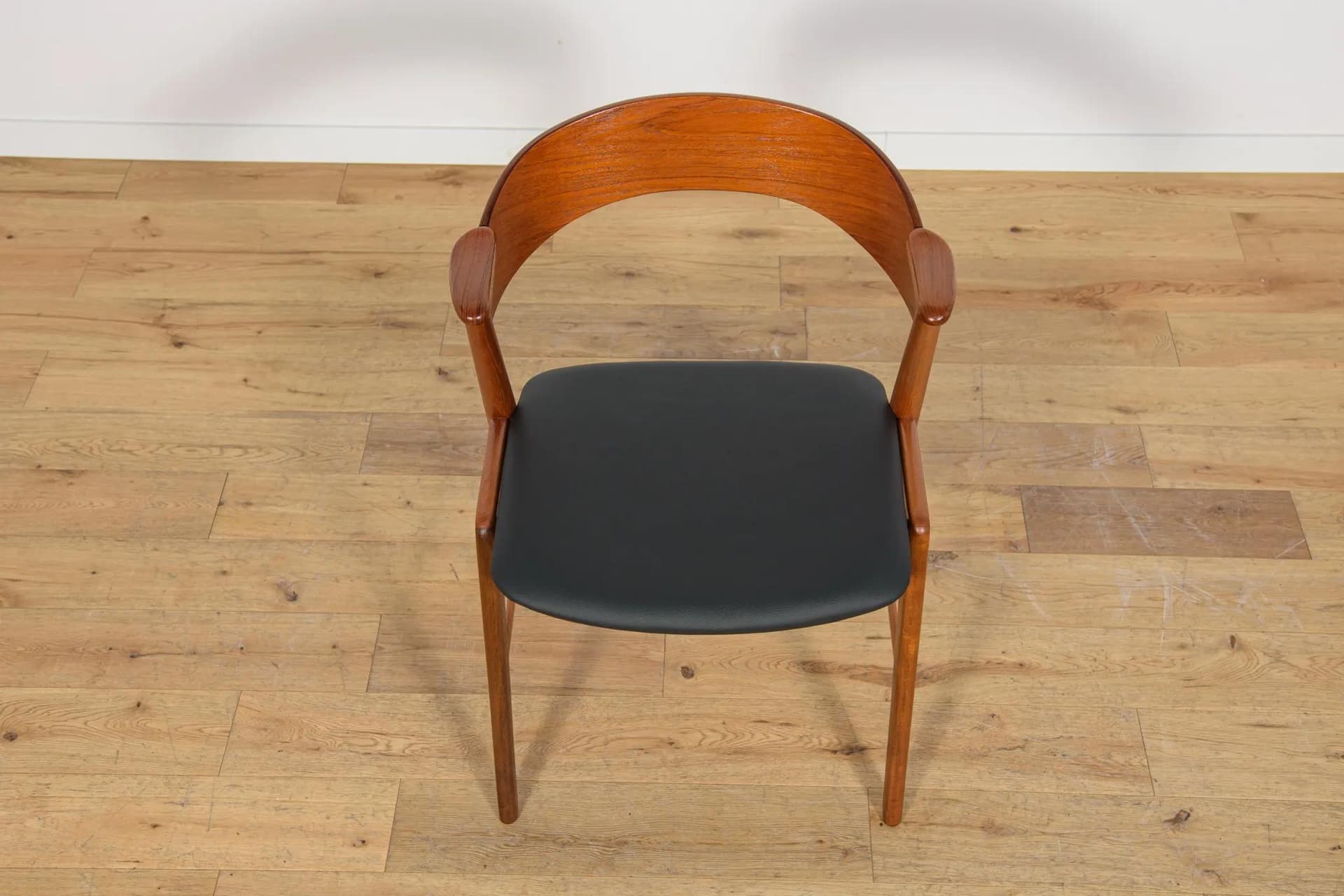 Set of four chairs, brown teak, black leather, Denmark, 1960s. - 70958