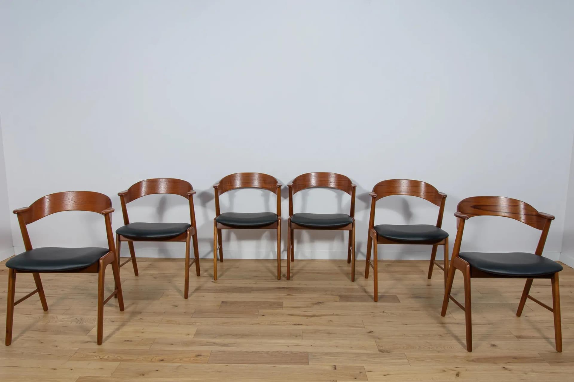 Set of six chairs, brown teak, black leather, Korup Stolefabrik, Denmark, 1960s. - 70631