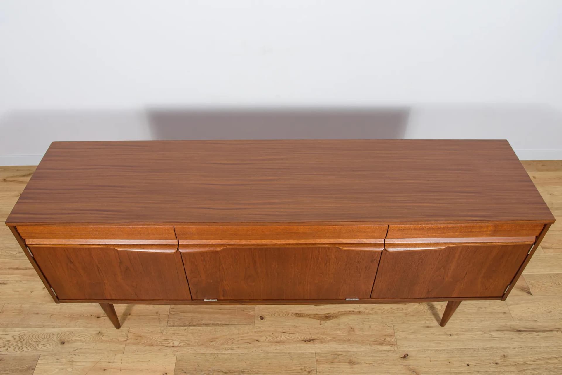 Sideboard, brown teak, United Kingdom, 1960s. - 70550