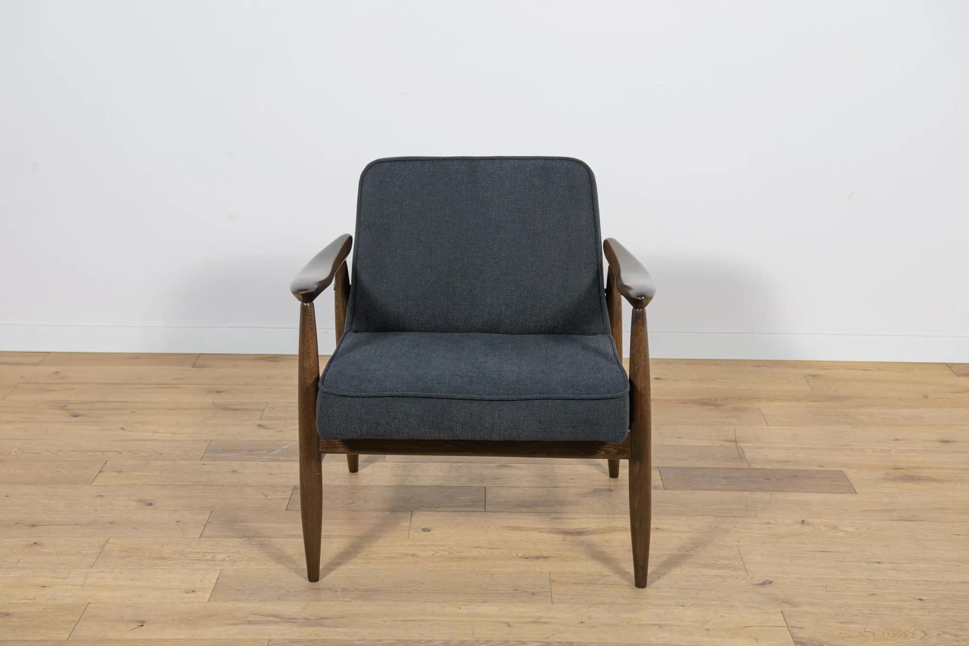 Pair of armchairs GFM-87, brown wood, black fabric, by J. Kędziorek, Poland, 1970s. - 70471