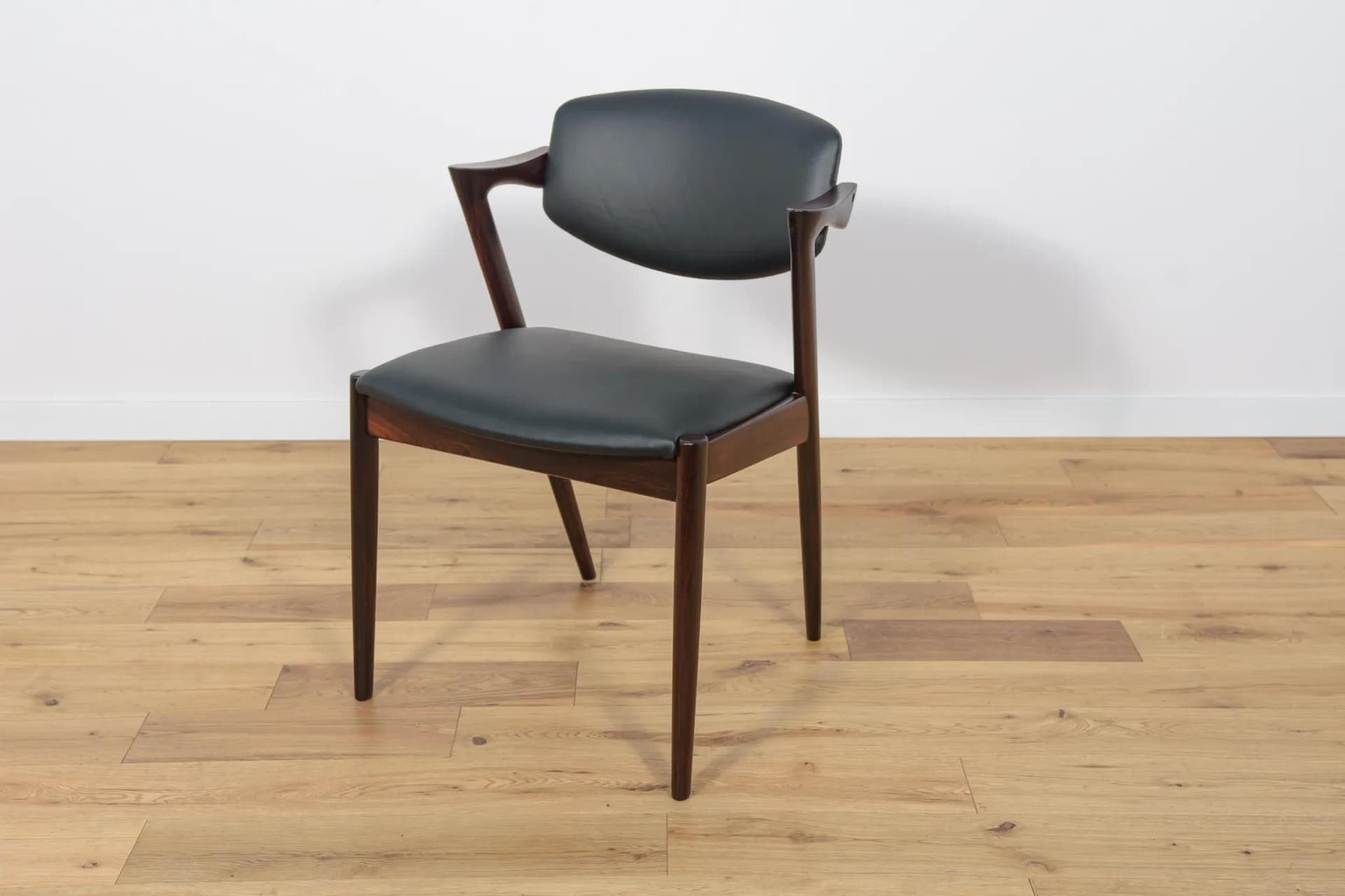 Set of six chairs Model 42, dark brown rosewood, black leather, by K. Kristiansen, Denmark, 1960s. - 69989