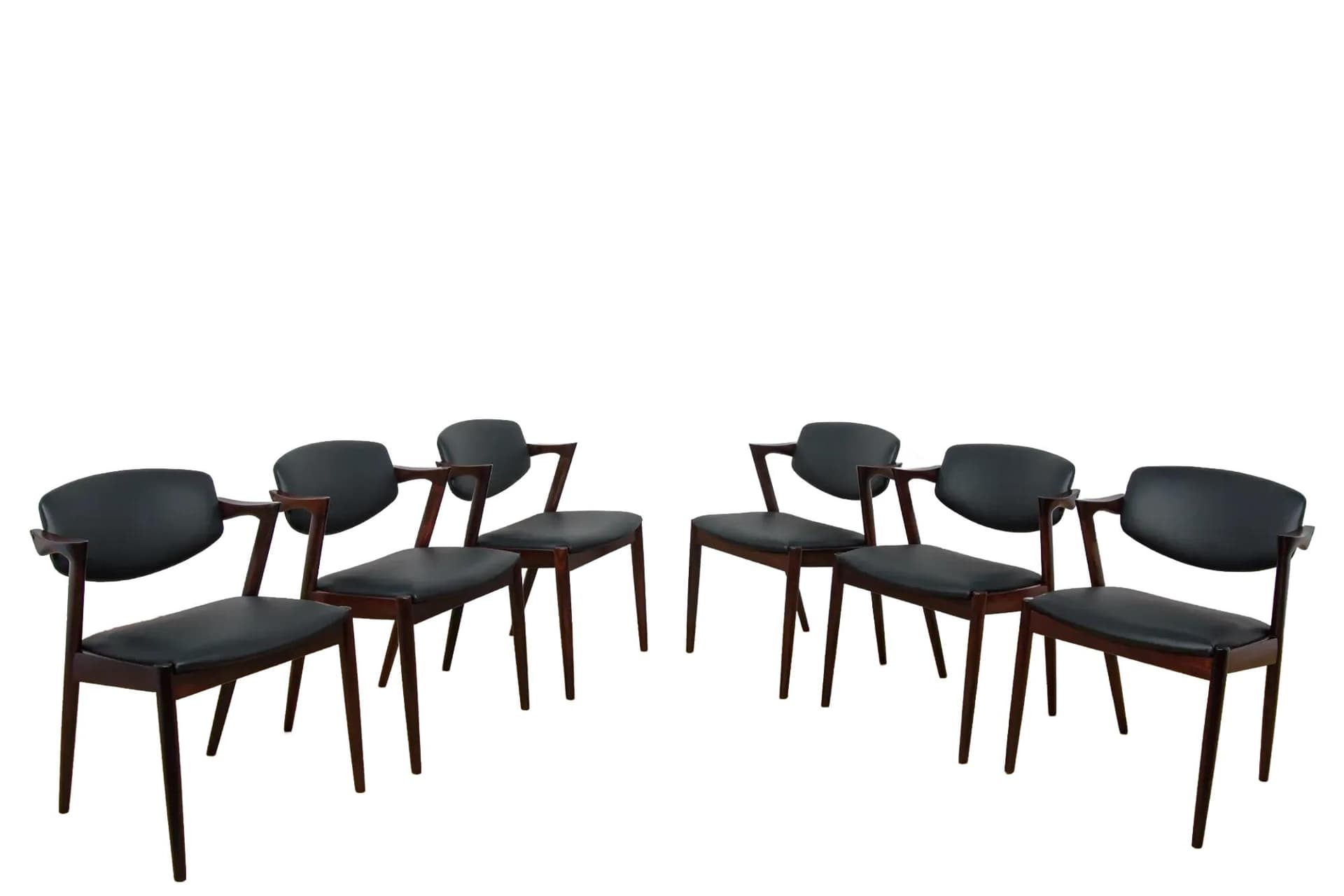 Set of six chairs Model 42, dark brown rosewood, black leather, by K. Kristiansen, Denmark, 1960s.
