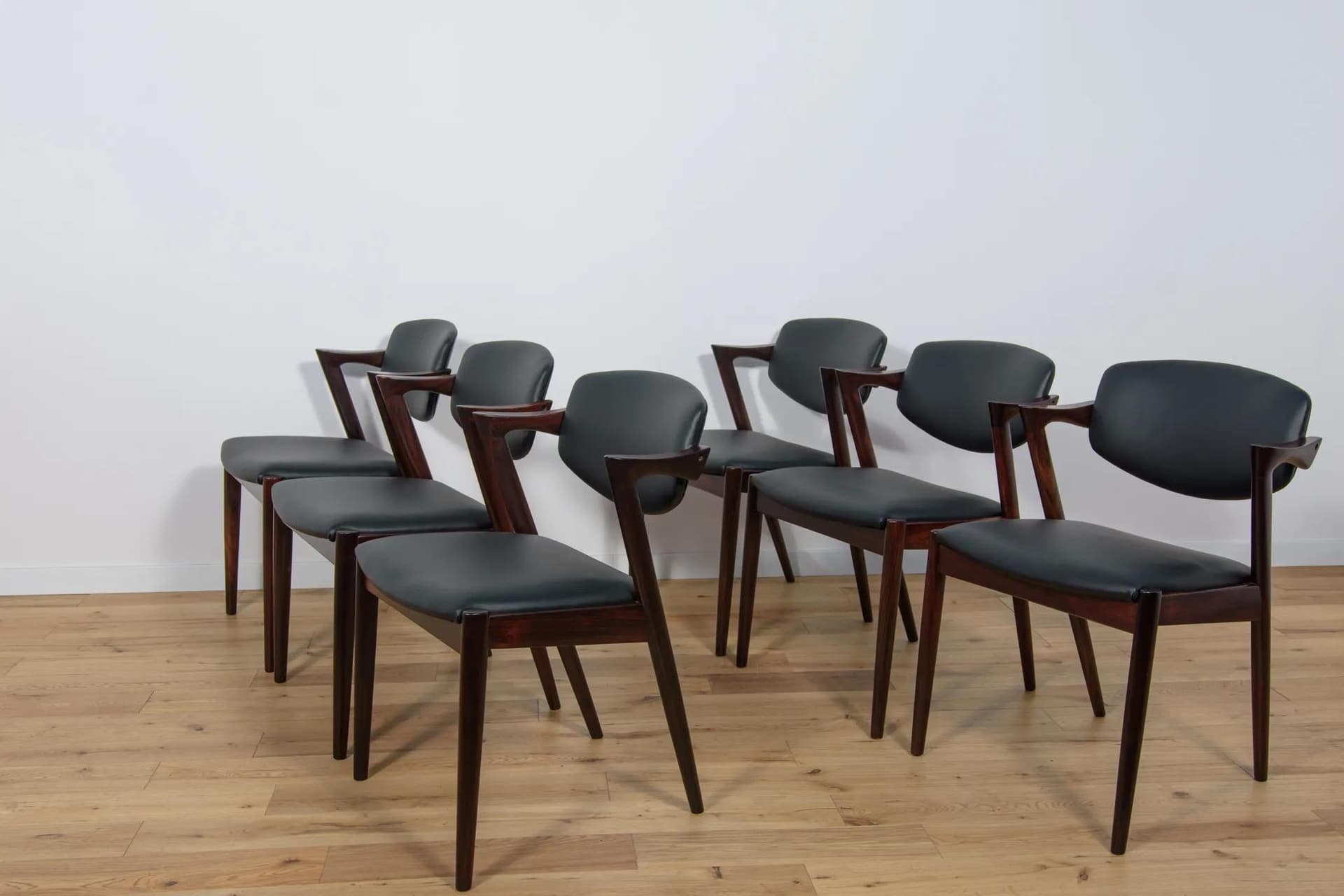 Set of six chairs Model 42, dark brown rosewood, black leather, by K. Kristiansen, Denmark, 1960s. - 69990