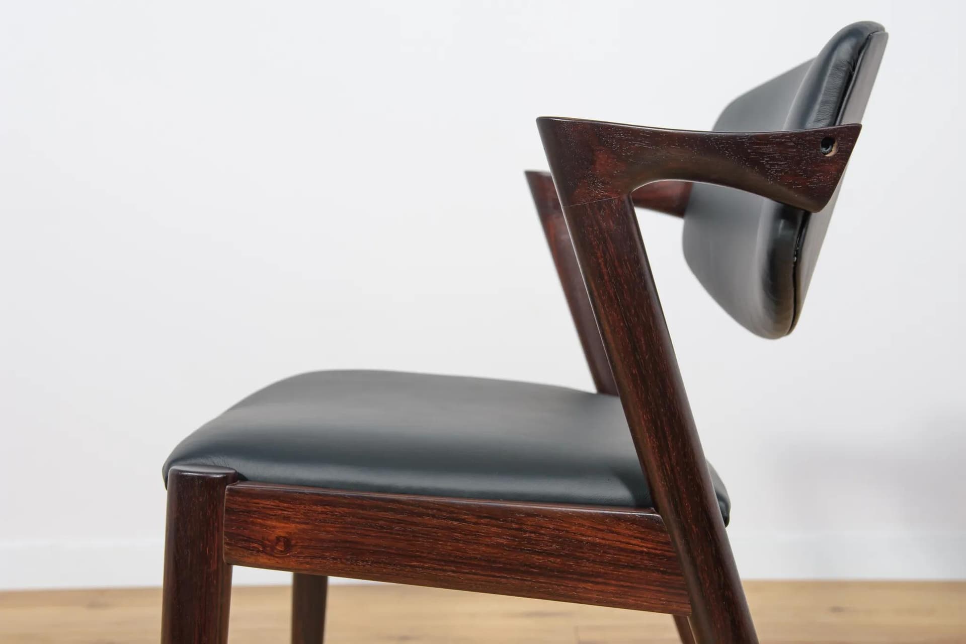 Set of six chairs Model 42, dark brown rosewood, black leather, by K. Kristiansen, Denmark, 1960s. - 69987
