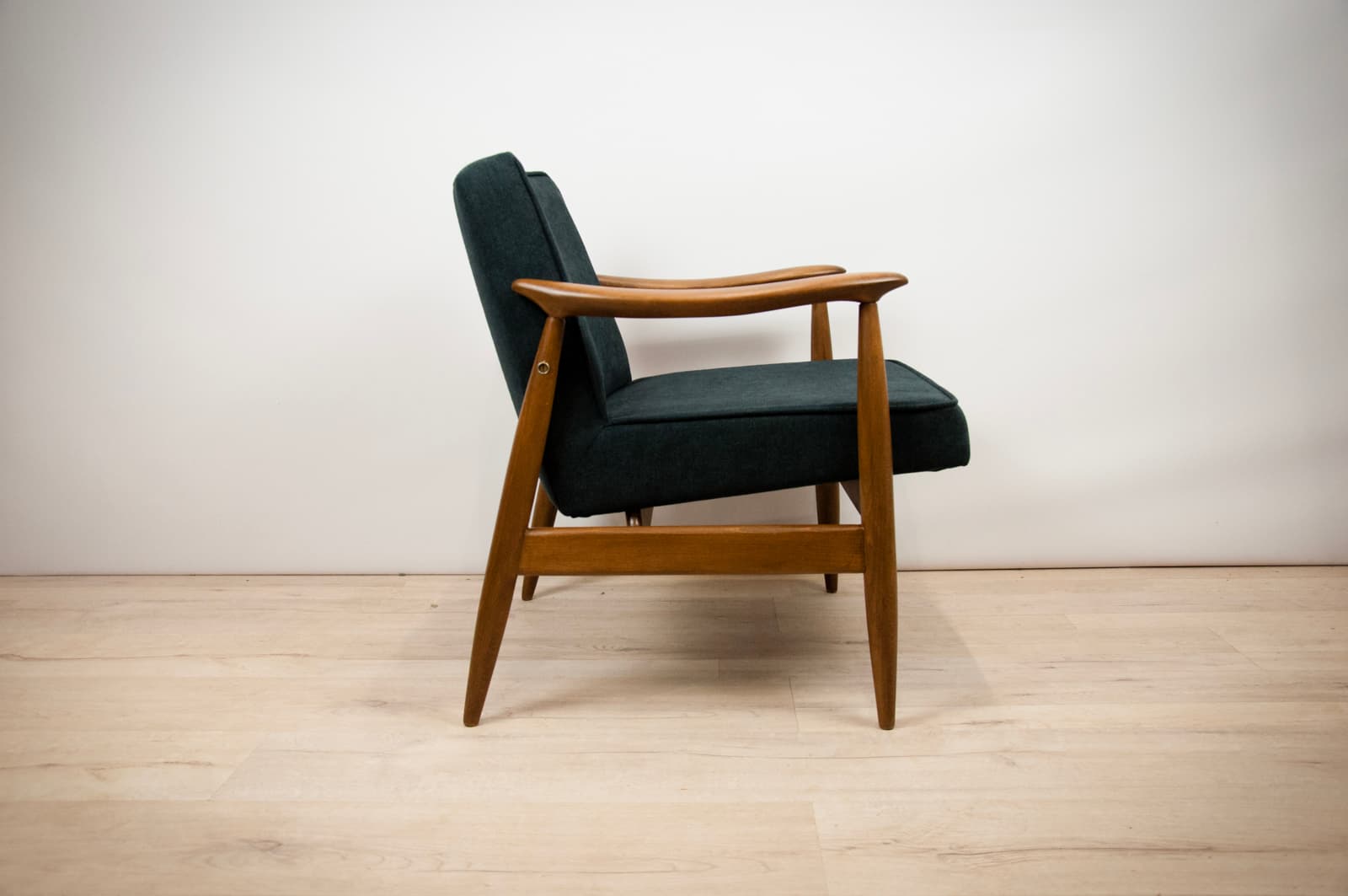Pair of armchairs GFM-87, oak, black fabric, by J. Kędziorek, Gościcińskie Fabryki Mebli, Poland, 1970s. - 69698