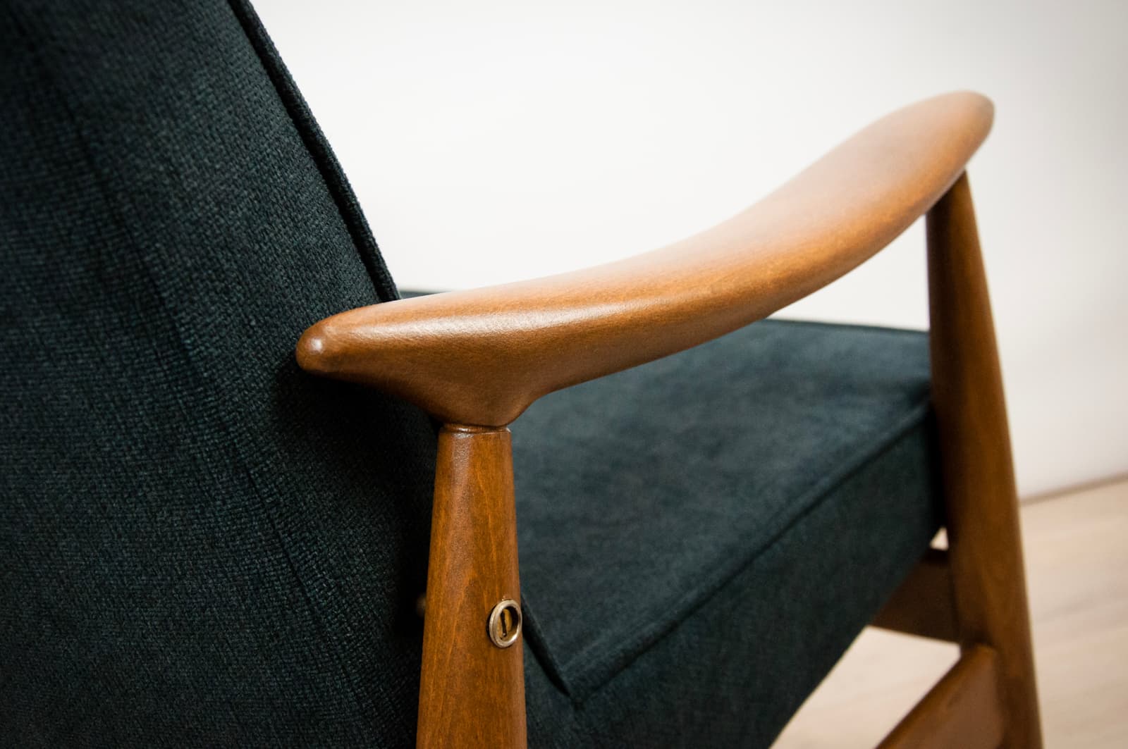 Pair of armchairs GFM-87, oak, black fabric, by J. Kędziorek, Gościcińskie Fabryki Mebli, Poland, 1970s. - 69697