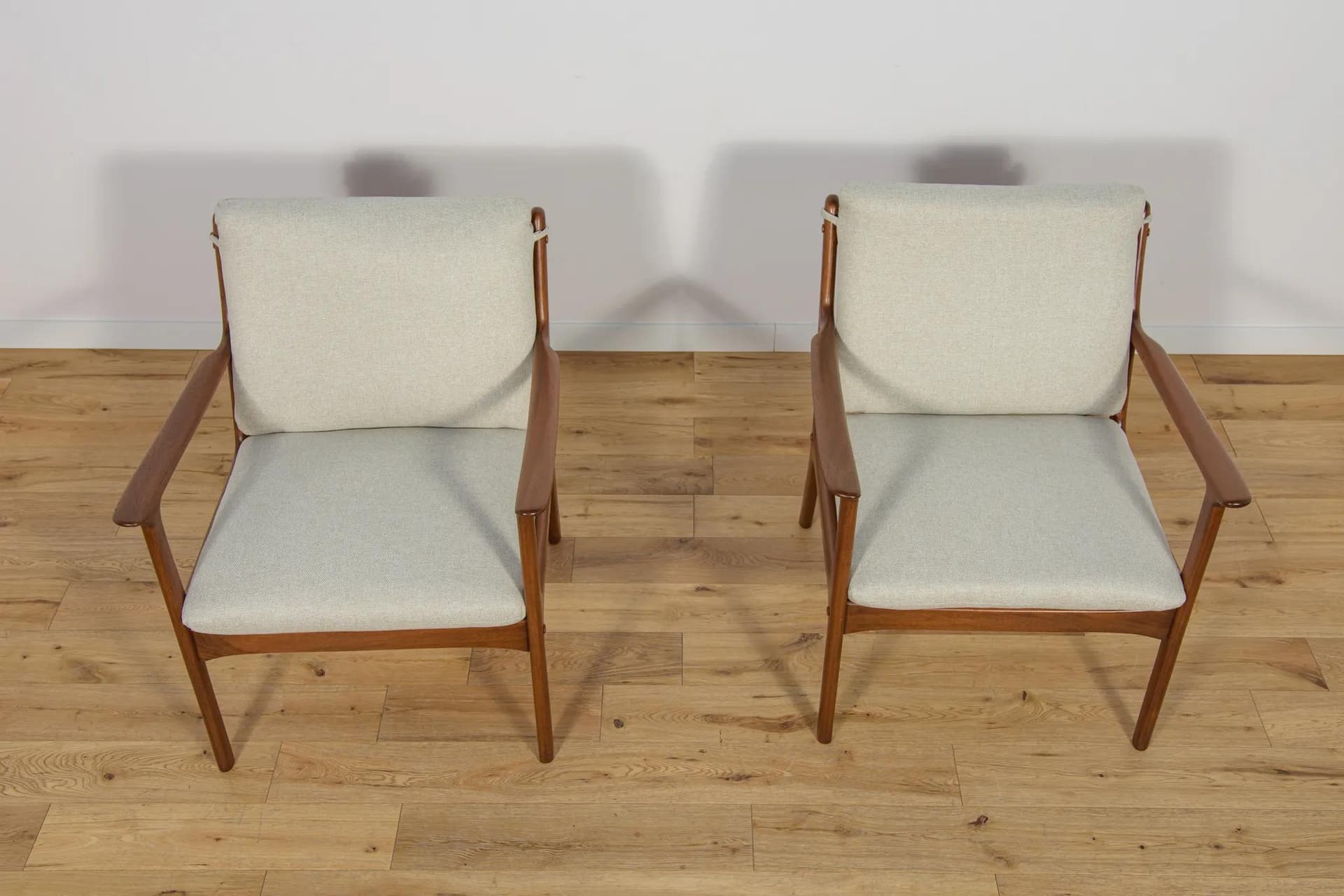 Pair of armchairs PJ112, mahogany brown, ivory wool, by O. Wanscher, Poul Jeppesens Møbelfabrik, Denmark, 1960s. - 74120