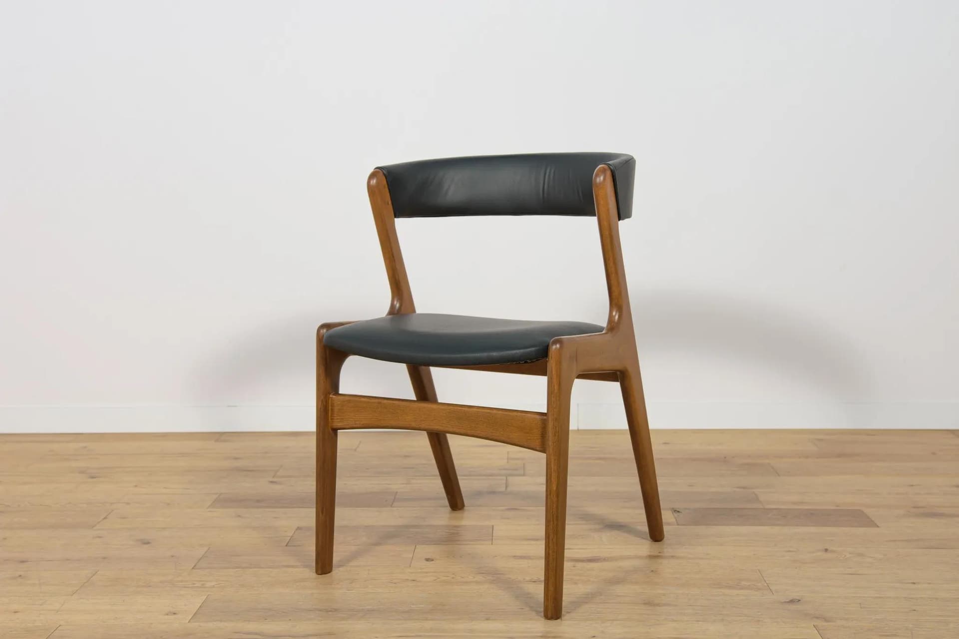 Set of four chairs, brown beech, black leather, Denmark, 1960s. - 73890