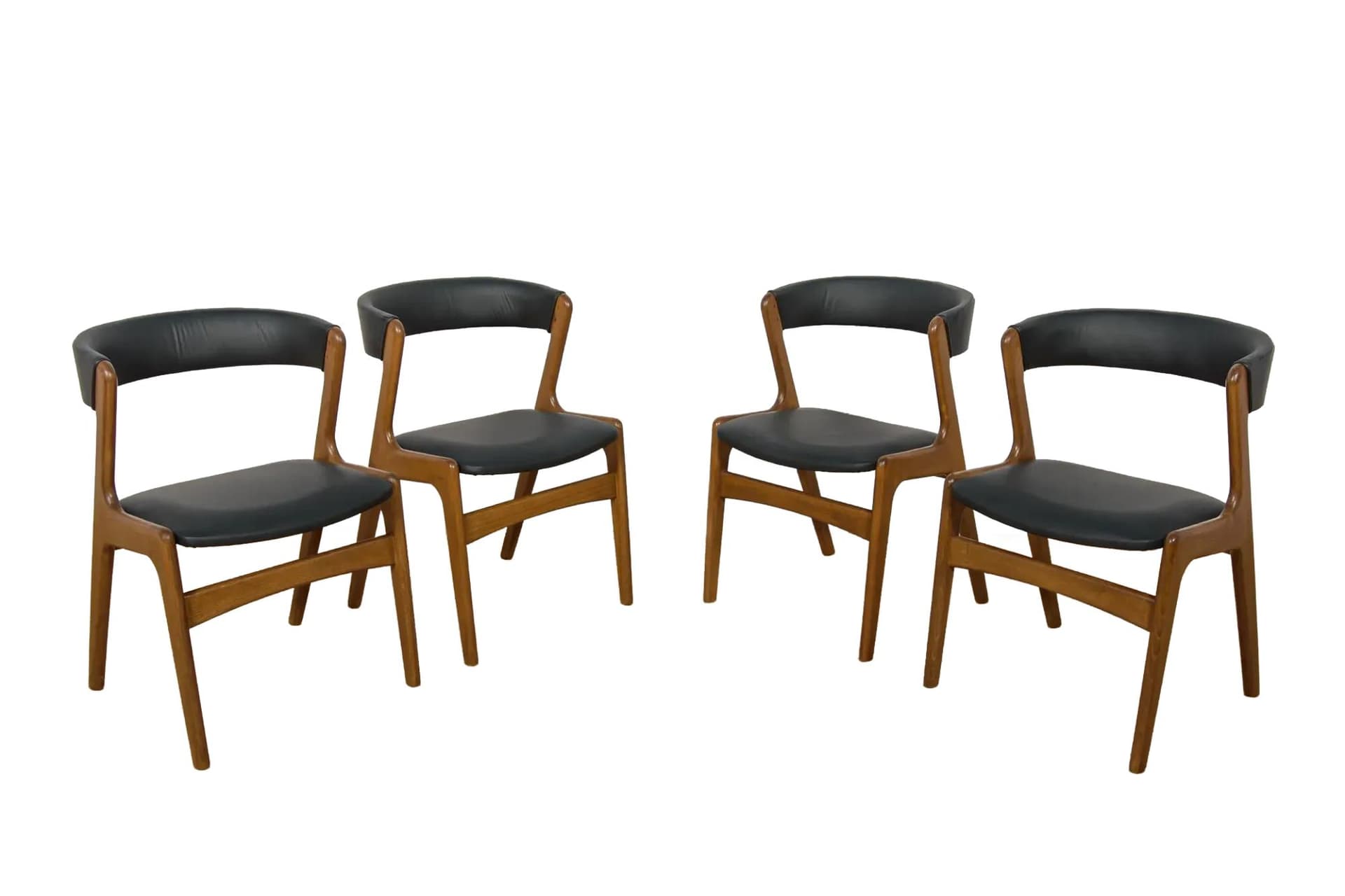 Set of four chairs, brown beech, black leather, Denmark, 1960s.