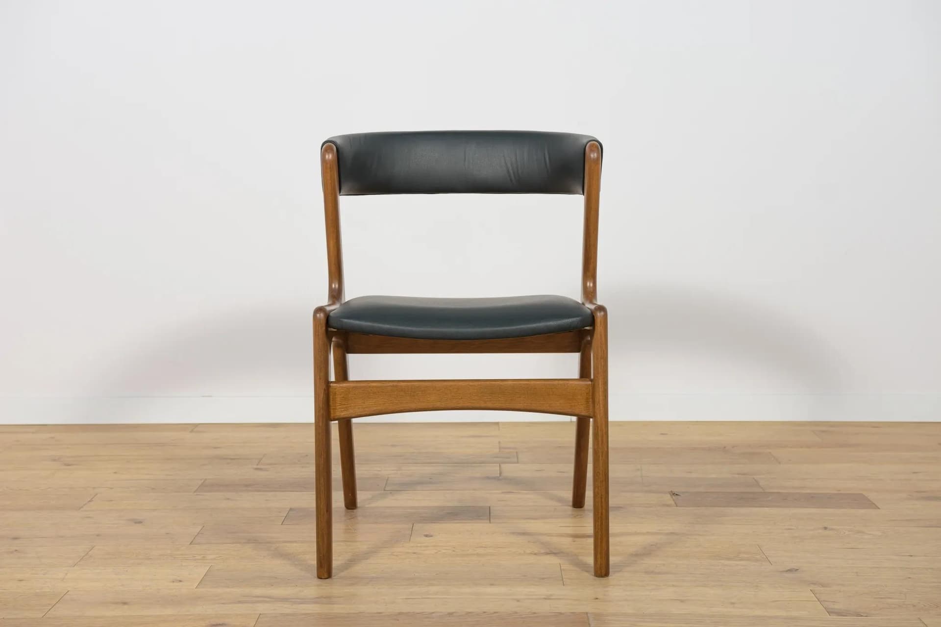 Set of four chairs, brown beech, black leather, Denmark, 1960s. - 73893