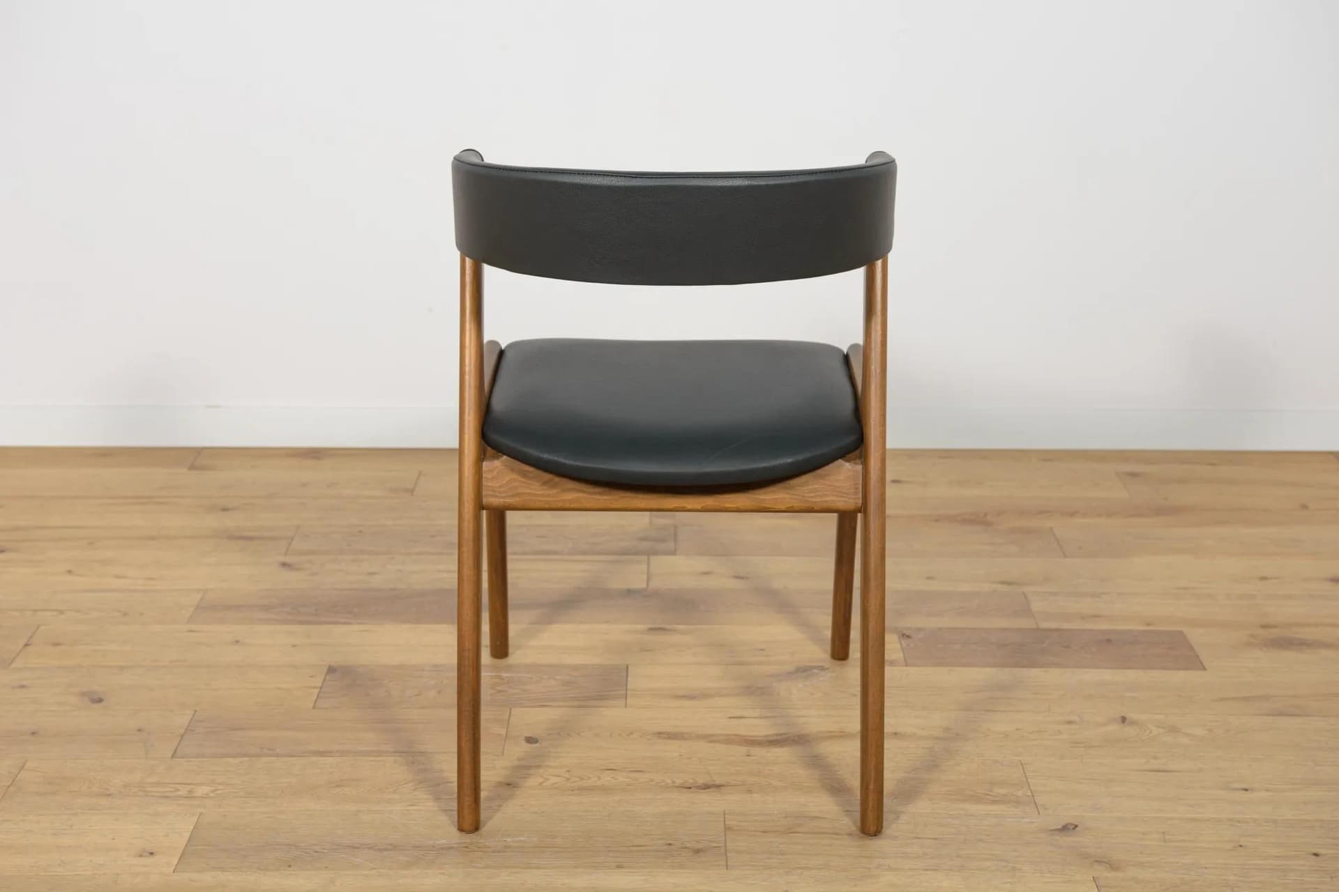 Set of four chairs, brown beech, black leather, Denmark, 1960s. - 73892