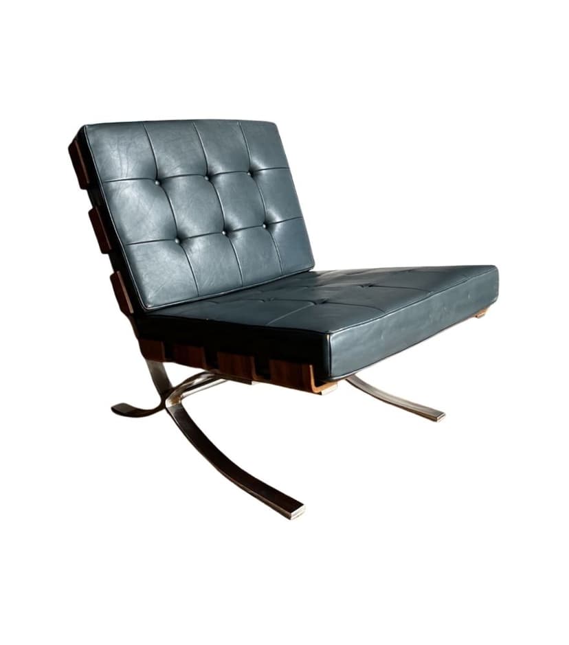 Armchair, black leather, brown wood, chrome, Switzerland, 1960s.