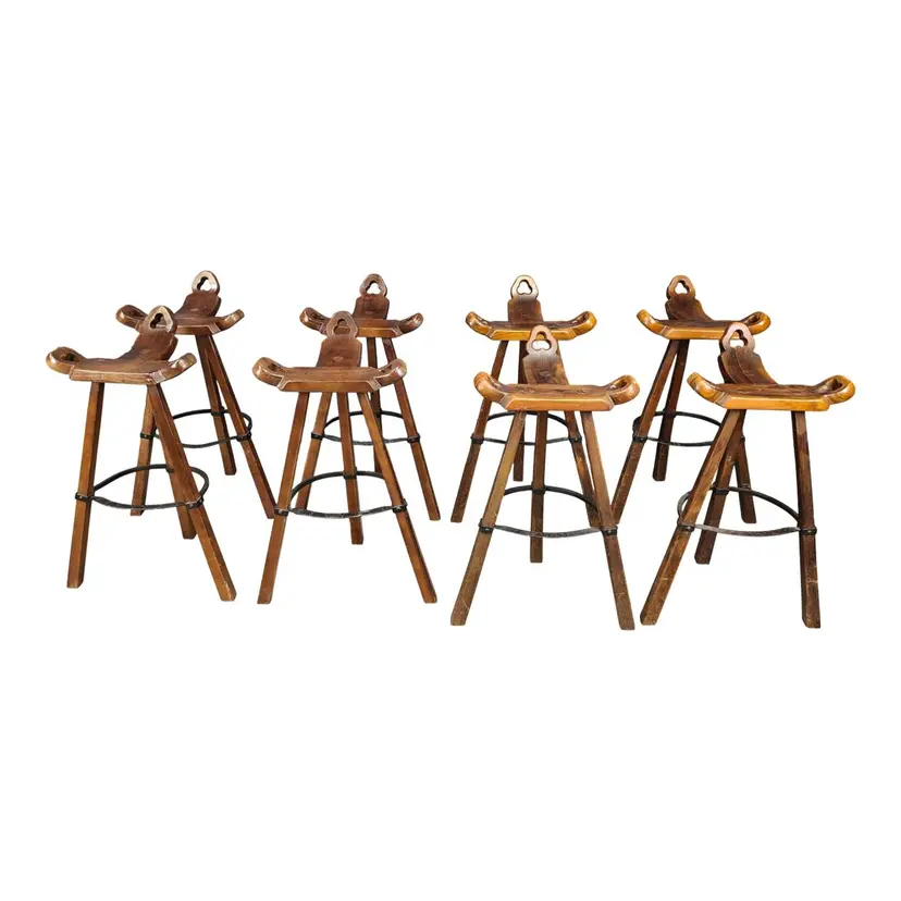 Set of eight brutalist bar stools, brown wood, black metal, Spain, 1960s.