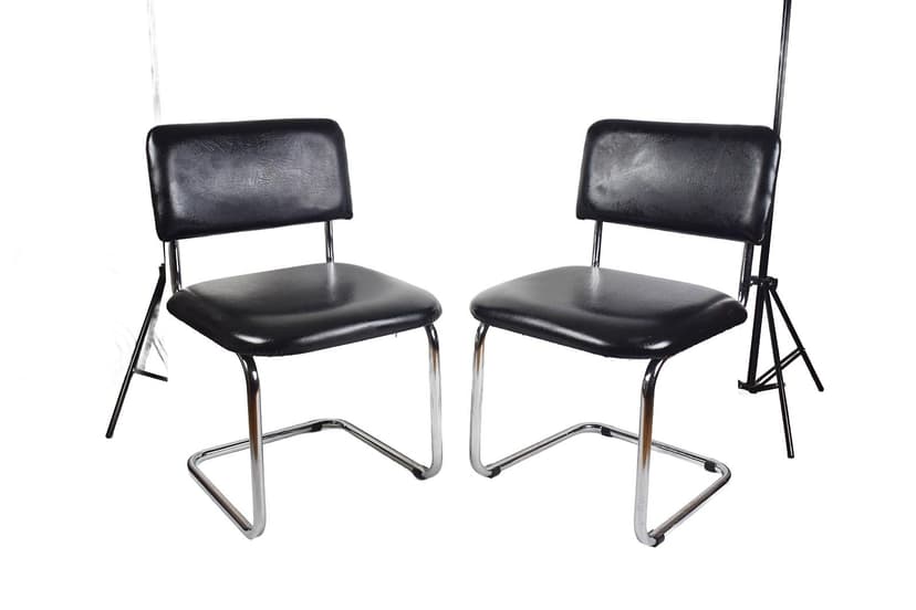 Pair of cantilever chairs, black faux leather, chromed steel, 1970s