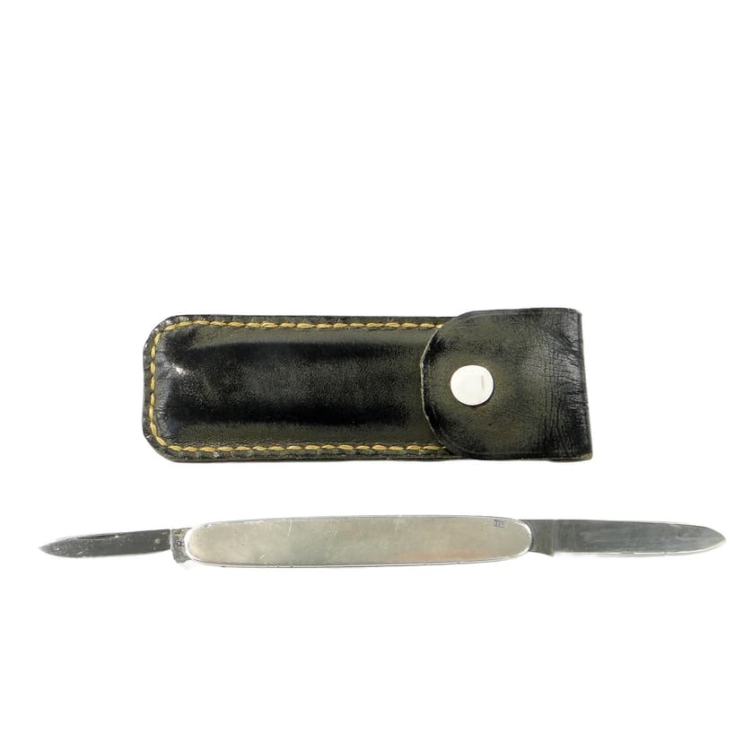 Pocket knife, silver, steel, black leather, United Kingdom, 1960s.