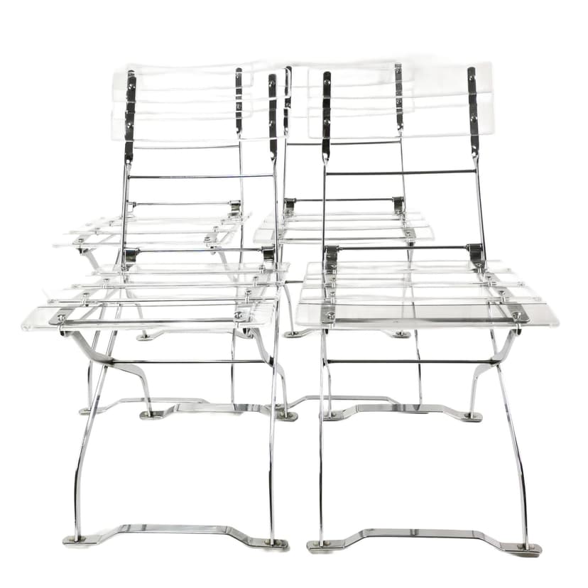 Set of four folding chairs, transparent plexiglass, silver metal, France, 1970s.