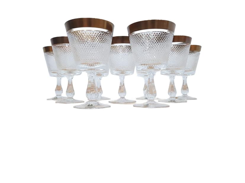 Set of nine glasses Rheinkristall, transparent crystal, gold-plated, Germany, 1960s.