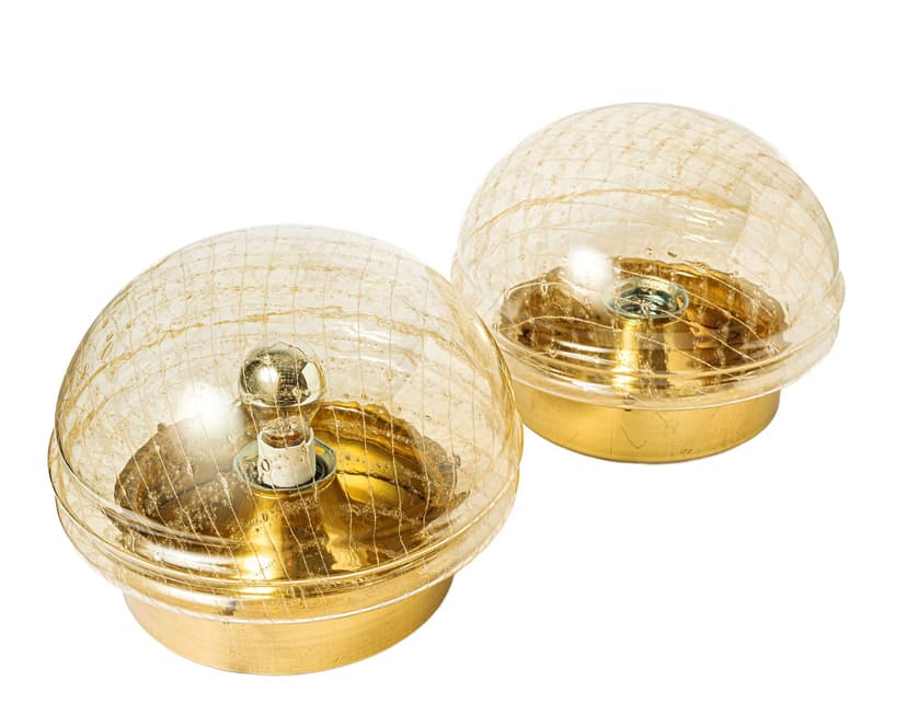 Pair of Space Age wall or ceiling lamps, gold glass, metal, Germany, 1970s.